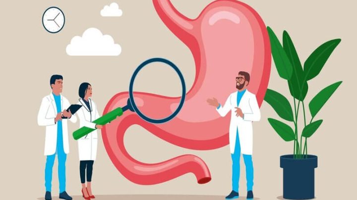 Ilustração de médicos examinando um estômago