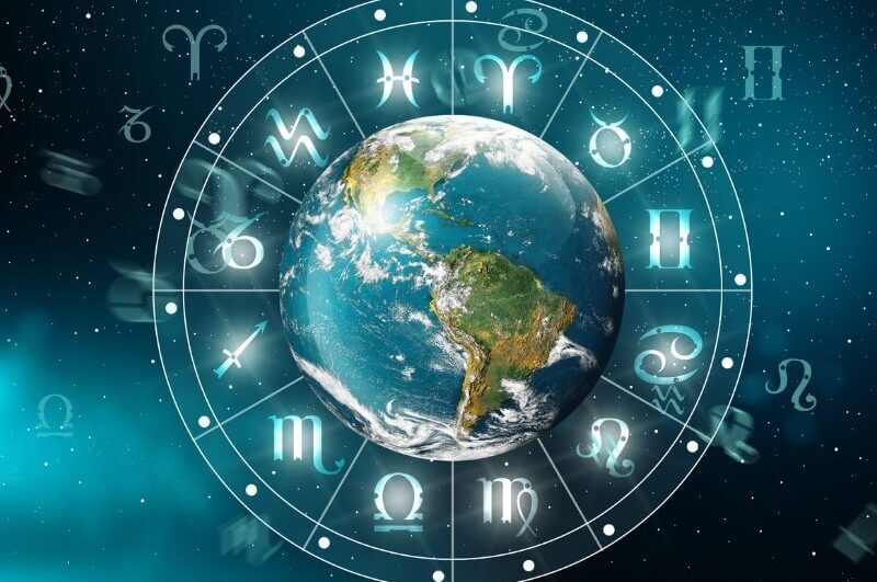 Ilustração do planeta Terra dentro de um circulo com os 12 signos do zodíaco